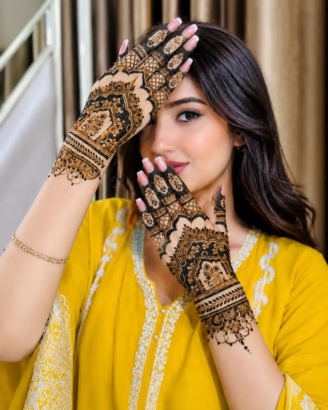 Elegant Arabic mehndi on back of hands