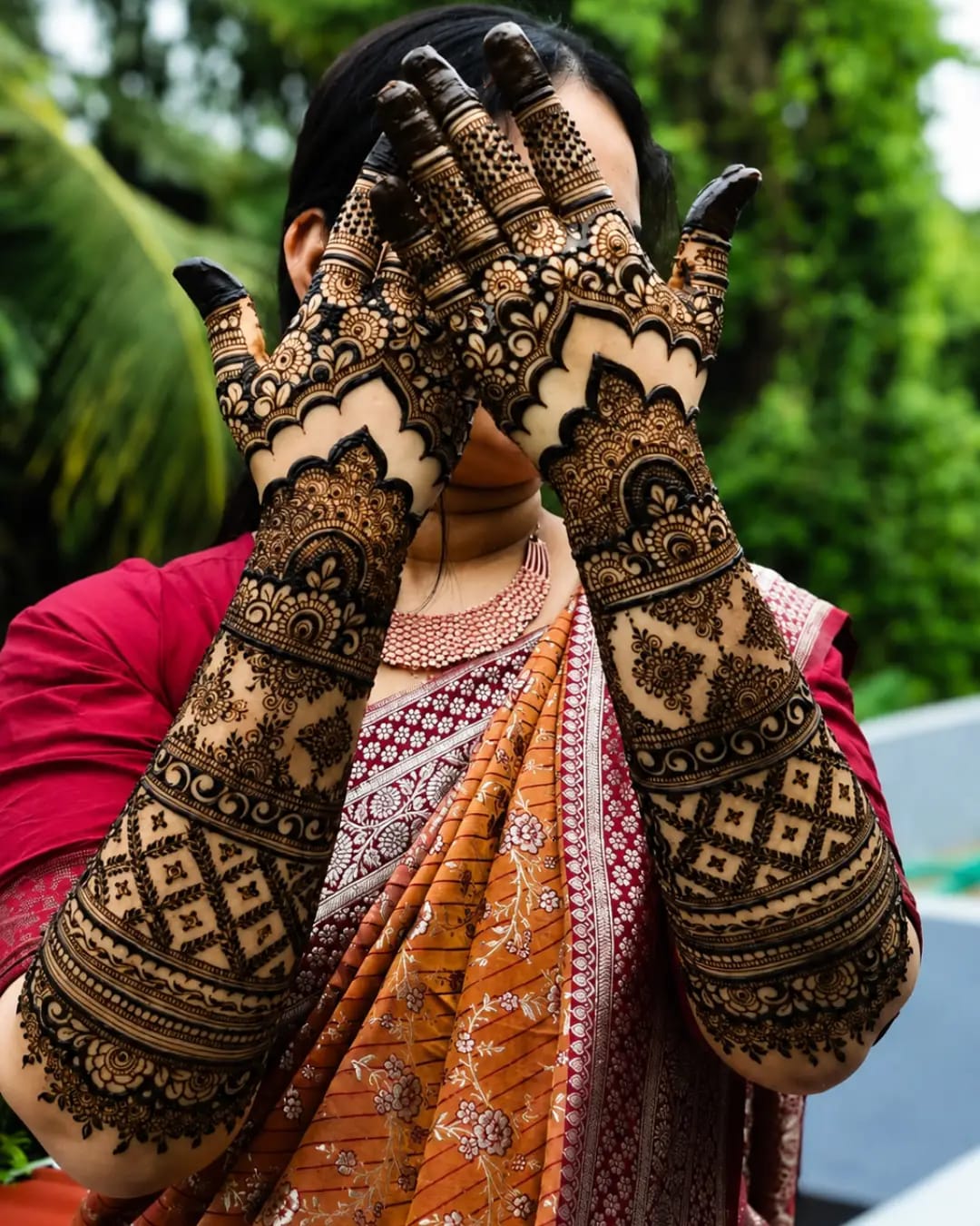 Full bridal mehndi covering both hands and forearms