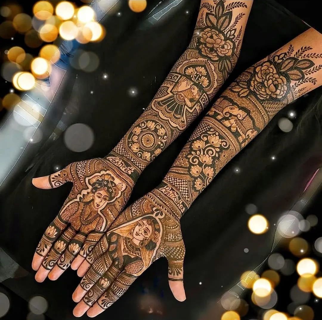 Bridal mehndi with rose motifs, portraits and couple names on both arms